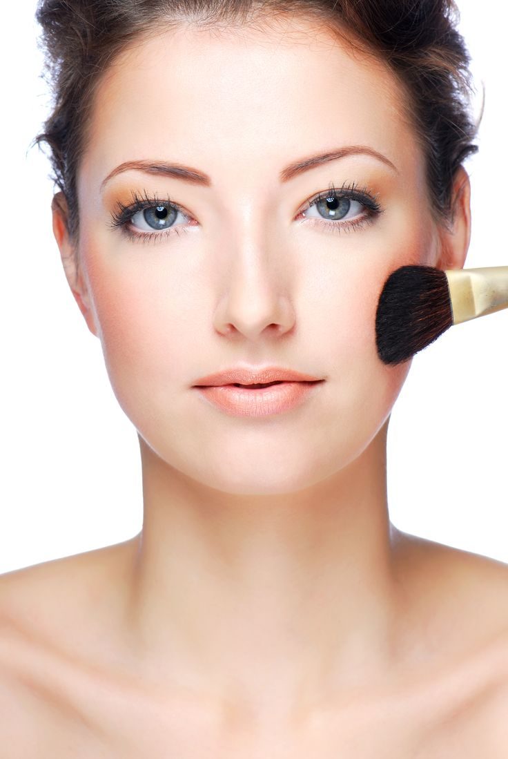 portrait-of-beautiful-young-adult-woman-applying-cosmetic