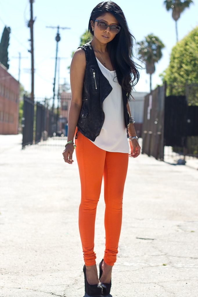 bright-orange-pants-and-black-vest