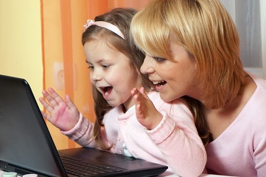 picture-of-happy-mother-and-child-with-laptop-computer