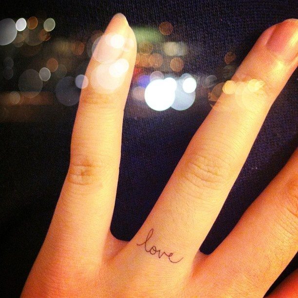 dainty-ring-finger-tattoo
